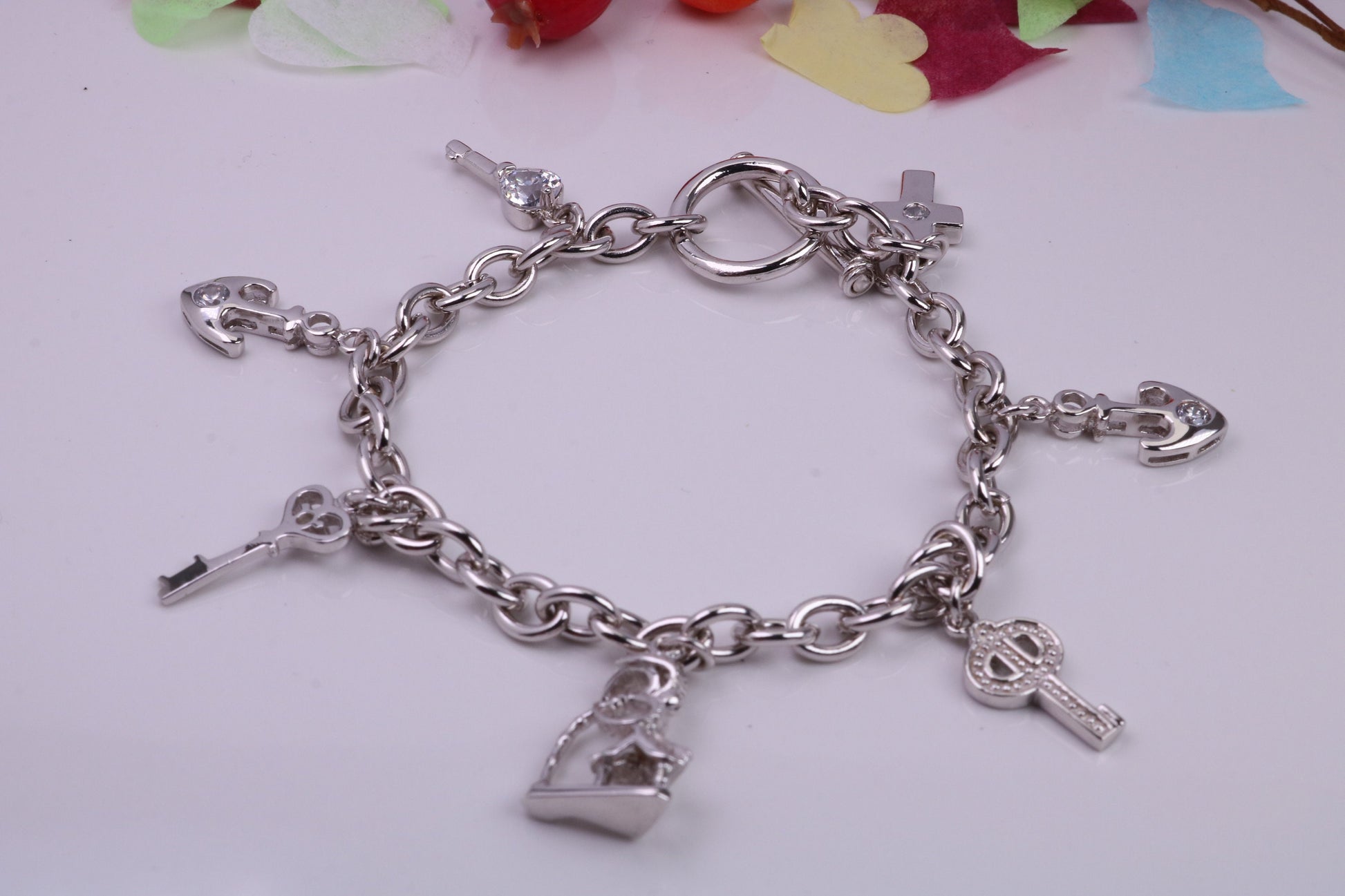 Ready to Wear Charms Bracelet, With Seven Charms Attached, Made from solid Sterling Silver, 7.50 Inches Long, Good Weighty Feel