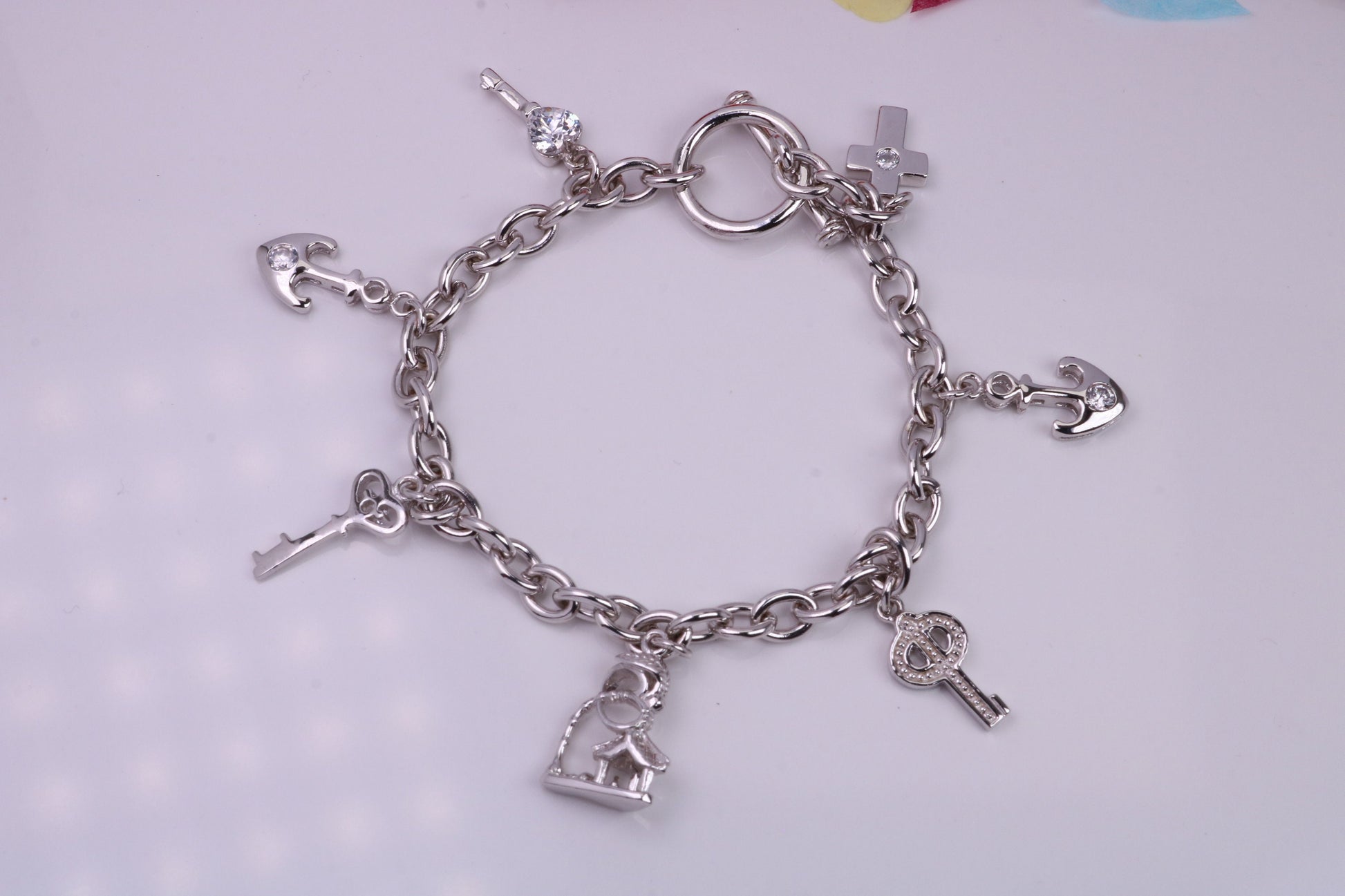 Ready to Wear Charms Bracelet, With Seven Charms Attached, Made from solid Sterling Silver, 7.50 Inches Long, Good Weighty Feel