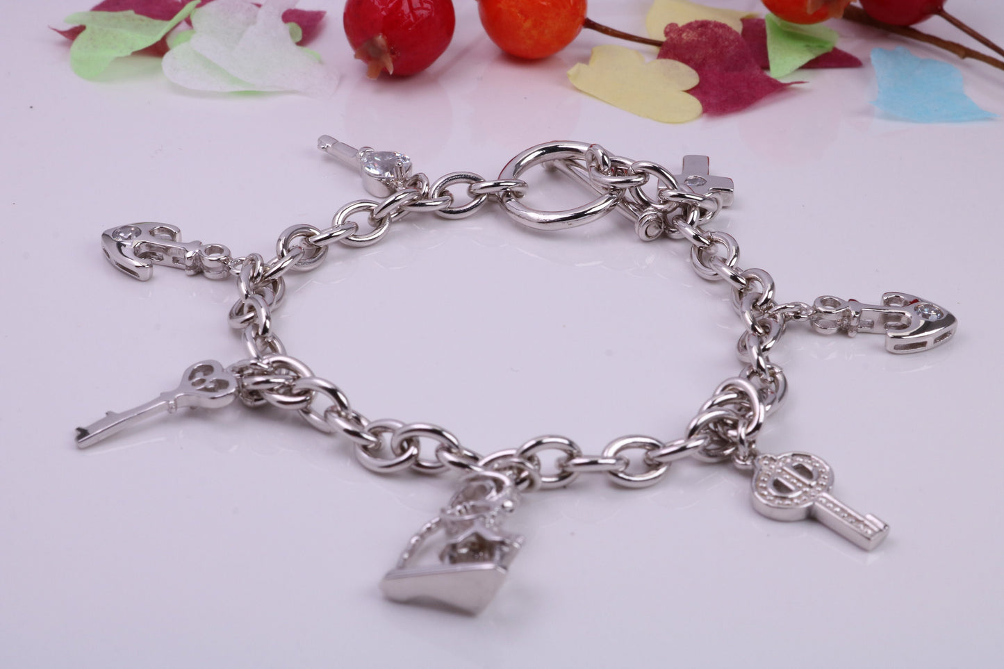 Ready to Wear Charms Bracelet, With Seven Charms Attached, Made from solid Sterling Silver, 7.50 Inches Long, Good Weighty Feel