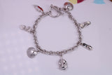 Ready to Wear Charms Bracelet, With Seven Charms Attached, Made from solid Sterling Silver, 7.50 Inches Long, Good Weighty Feel