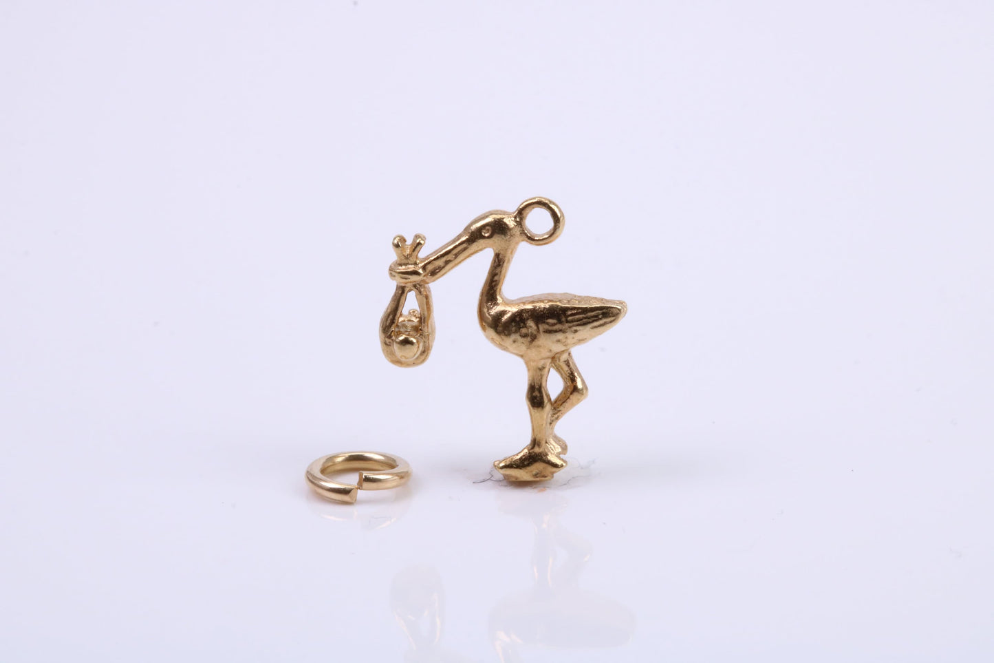 Flying Stork Delivering Baby Charm, Traditional Charm, Made from Solid 9ct Yellow Gold, British Hallmarked, Complete with Attachment Link