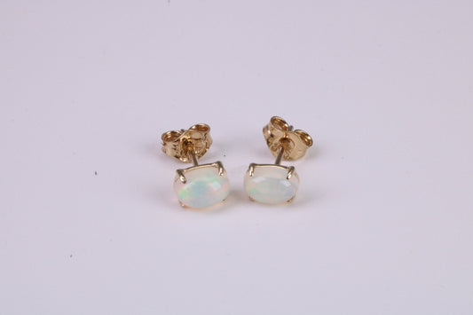 Natural Oval cut Opal set Stud Earrings Made from Solid Yellow Gold