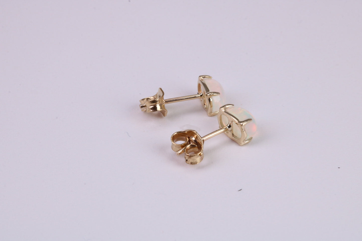 Natural Oval cut Opal set Stud Earrings Made from Solid Yellow Gold