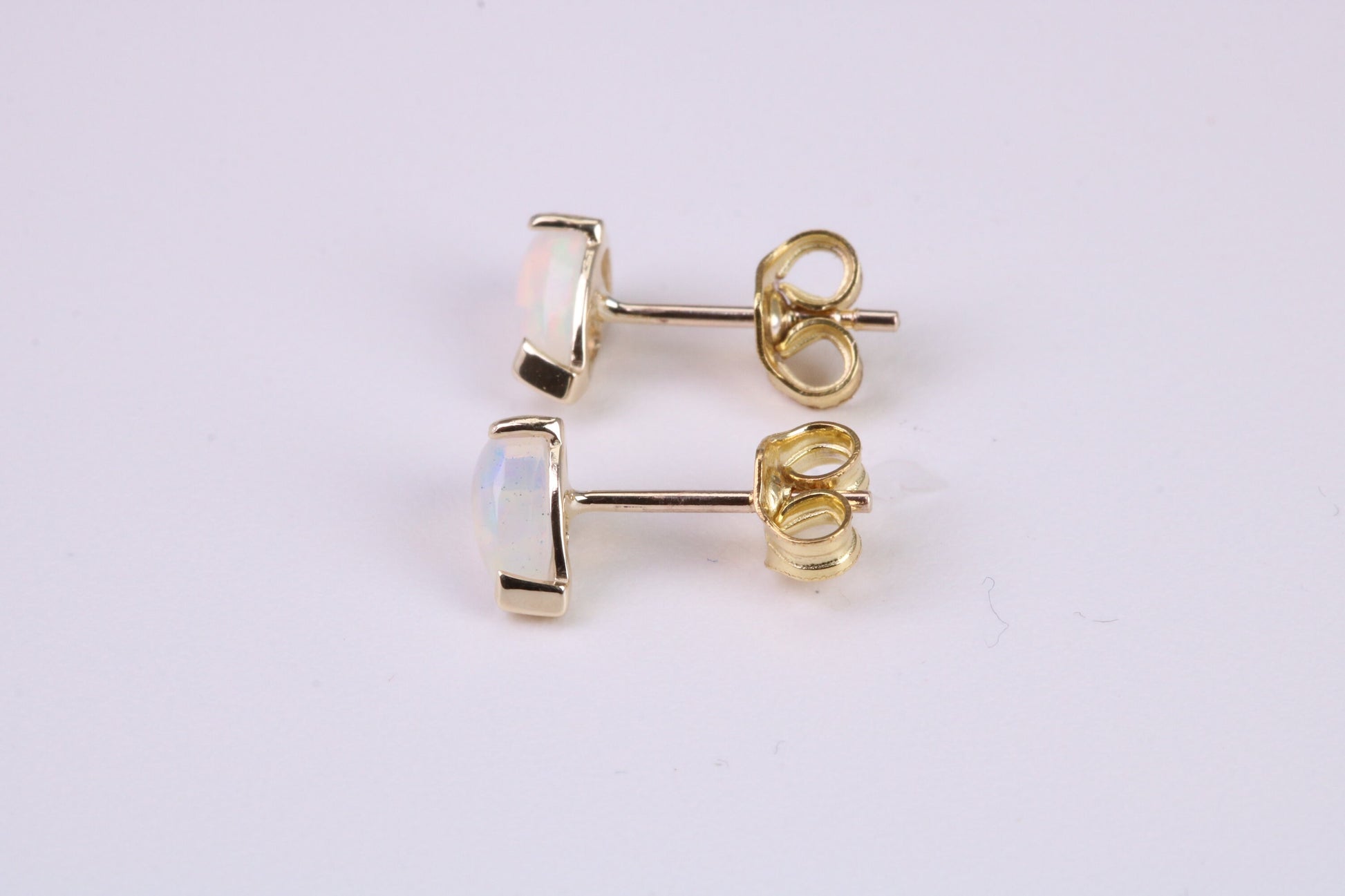 Natural Teardrop cut Opal set Stud Earrings Made from Solid Yellow Gold