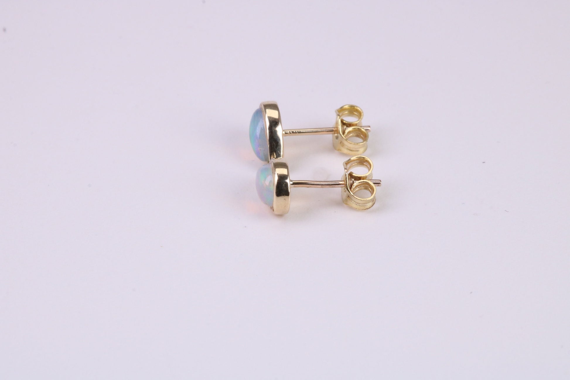 Natural Teardrop cut Opal set Stud Earrings Made from Solid Yellow Gold