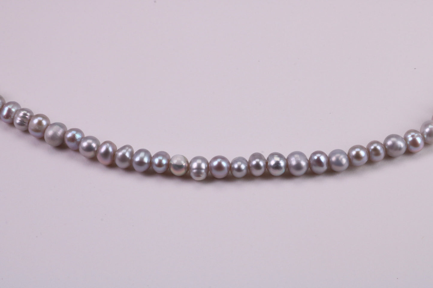 16 Inches Long Single Strand Natural 5 mm Round Grey Pearl Necklace set in Silver
