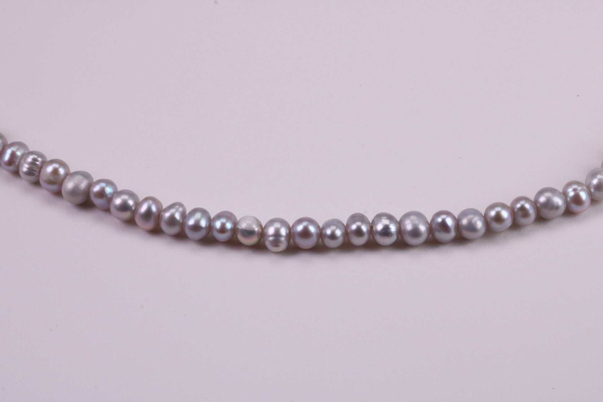 16 Inches Long Single Strand Natural 5 mm Round Grey Pearl Necklace set in Silver