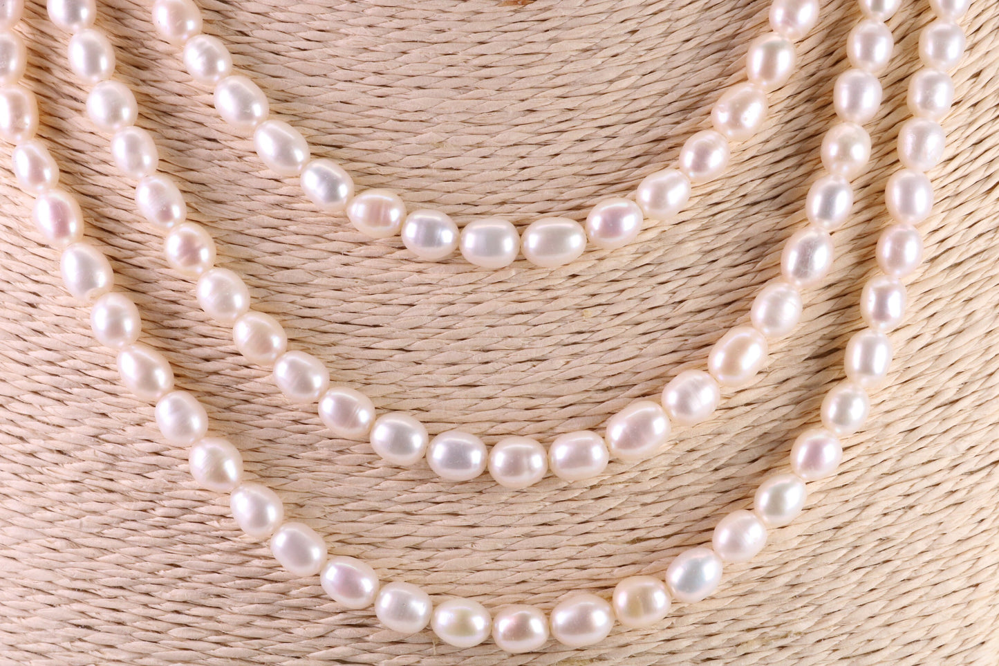Three Strand Natural 7 mm Oval Shaped Pearl Necklace set in Silver, Three Strands Measures 16, 18 and 20 inches Long