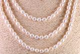 Three Strand Natural 7 mm Oval Shaped Pearl Necklace set in Silver, Three Strands Measures 16, 18 and 20 inches Long