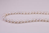 20 Inches Long Single Strand Natural 8 mm Round Pearl Necklace set in Silver