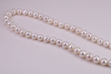 20 Inches Long Single Strand Natural 8 mm Round Pearl Necklace set in Silver