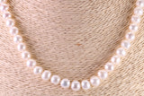 16 Inches Long Single Strand Natural 8 mm Round Pearl Necklace set in Silver
