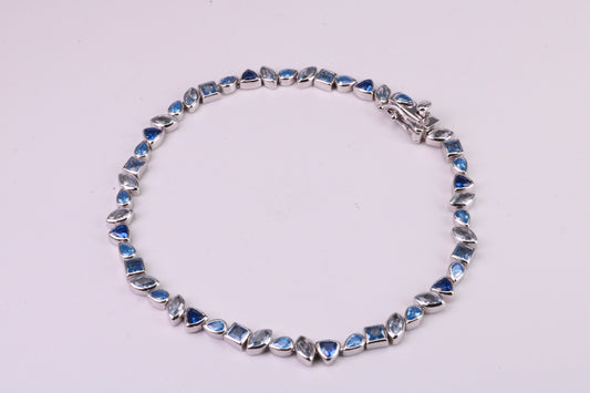 Blue Sapphire, Aquamarine and Topaz C Z Set Bracelet, 7.50 inch Length, Made from solid Sterling Silver