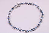 Blue Sapphire, Aquamarine and Topaz C Z Set Bracelet, 7.50 inch Length, Made from solid Sterling Silver