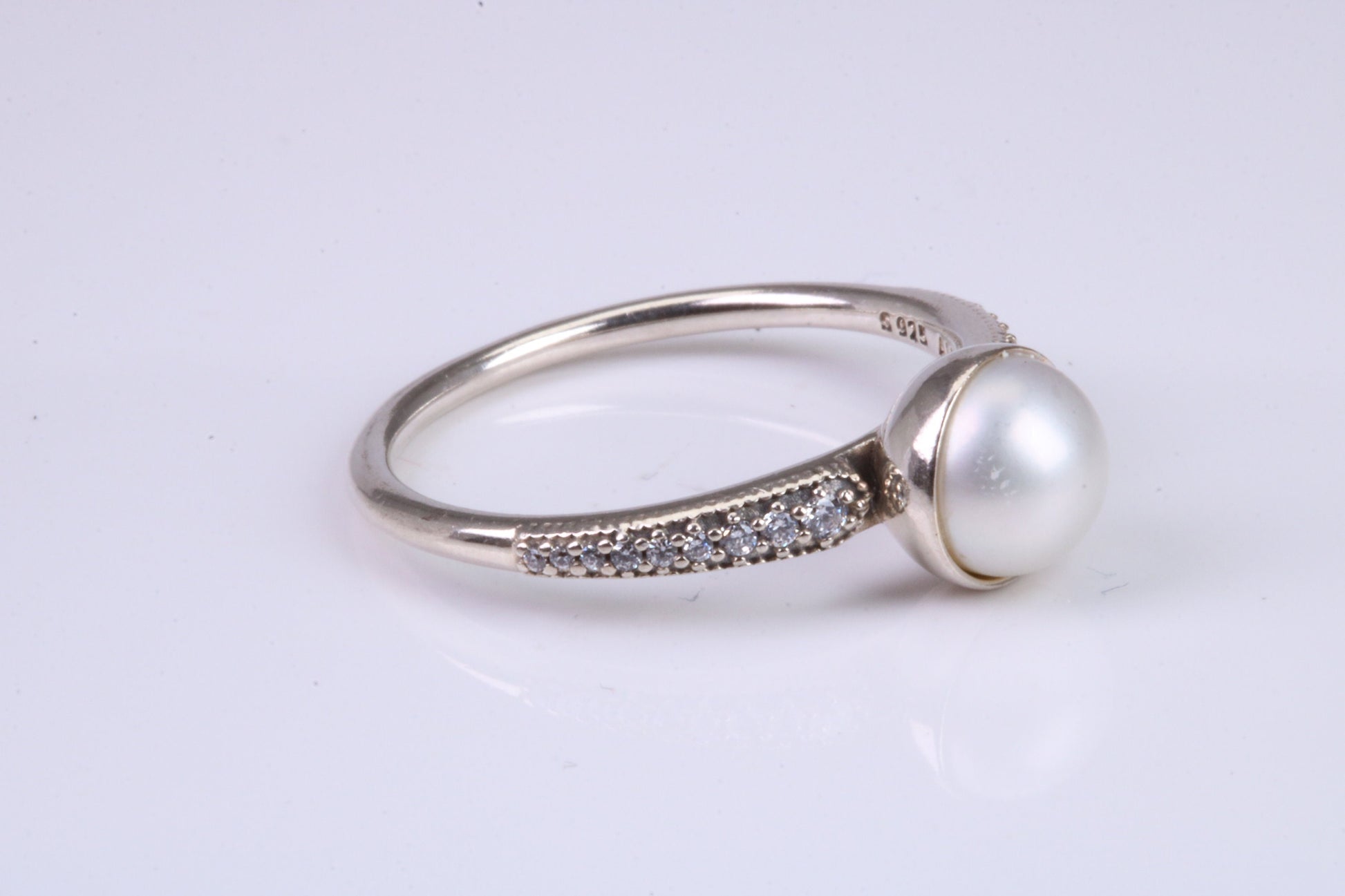 Natural 7 mm Round Pearl and Cubic Zirconia set Ring set in Solid Silver