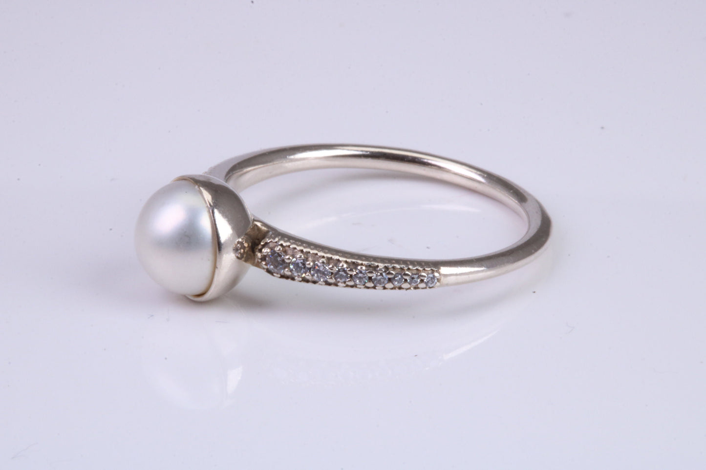 Natural 7 mm Round Pearl and Cubic Zirconia set Ring set in Solid Silver