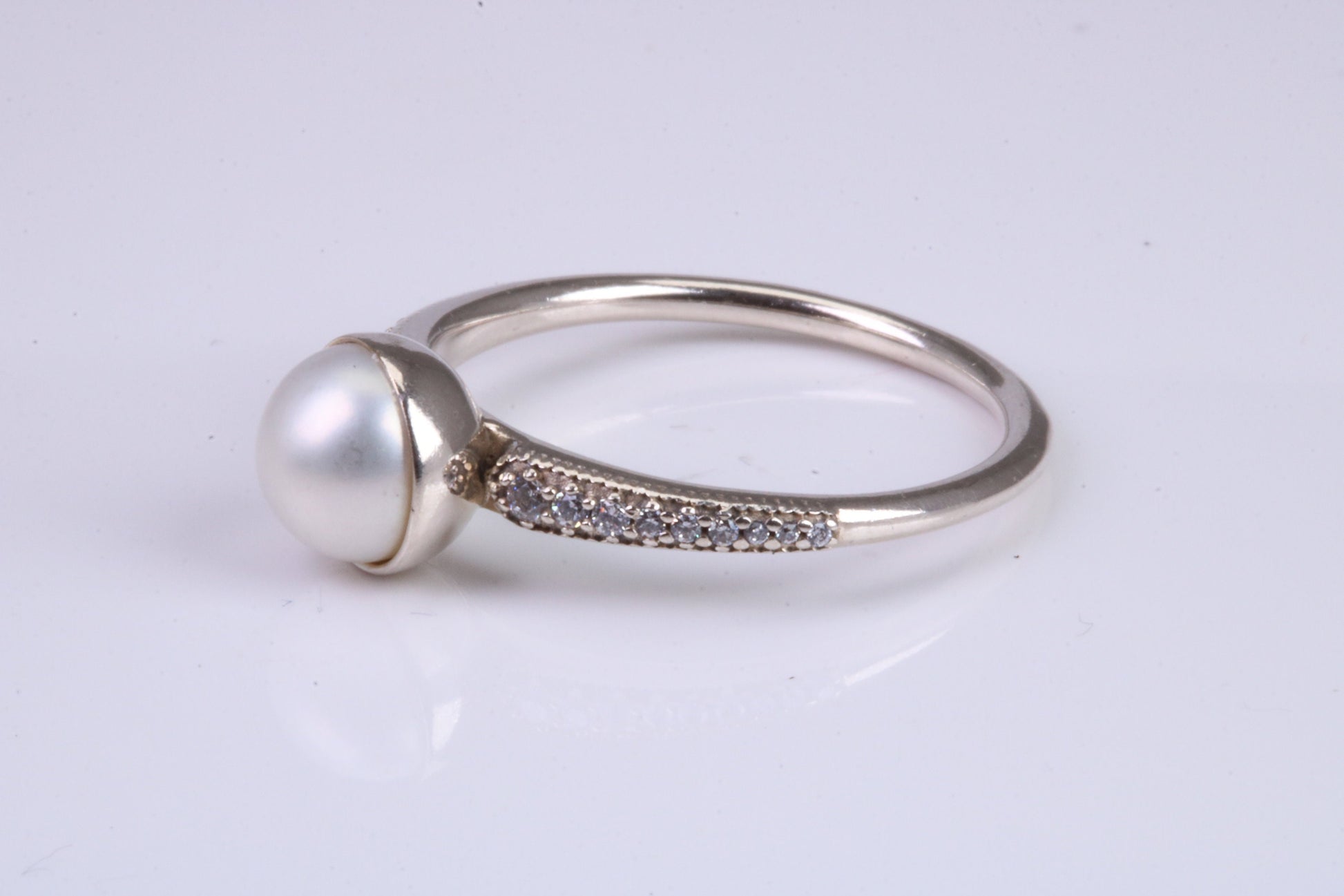 Natural 7 mm Round Pearl and Cubic Zirconia set Ring set in Solid Silver
