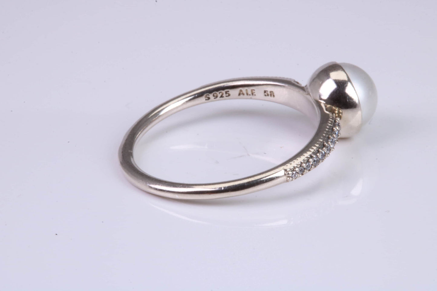 Natural 7 mm Round Pearl and Cubic Zirconia set Ring set in Solid Silver