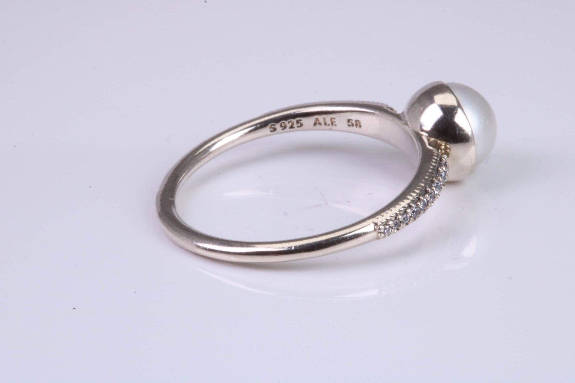 Natural 7 mm Round Pearl and Cubic Zirconia set Ring set in Solid Silver