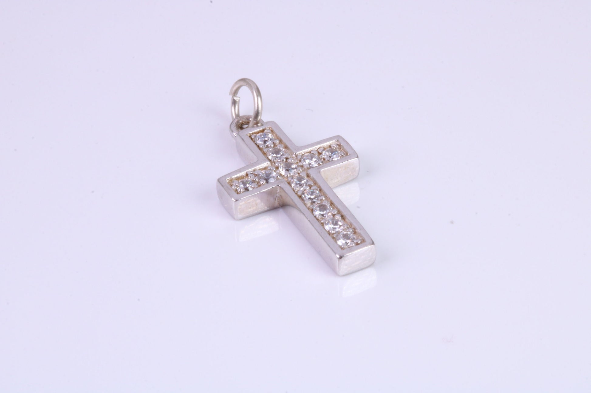 Small 23 mm Long Diamond White C Z set Silver Cross, Made From Solid Cast Silver