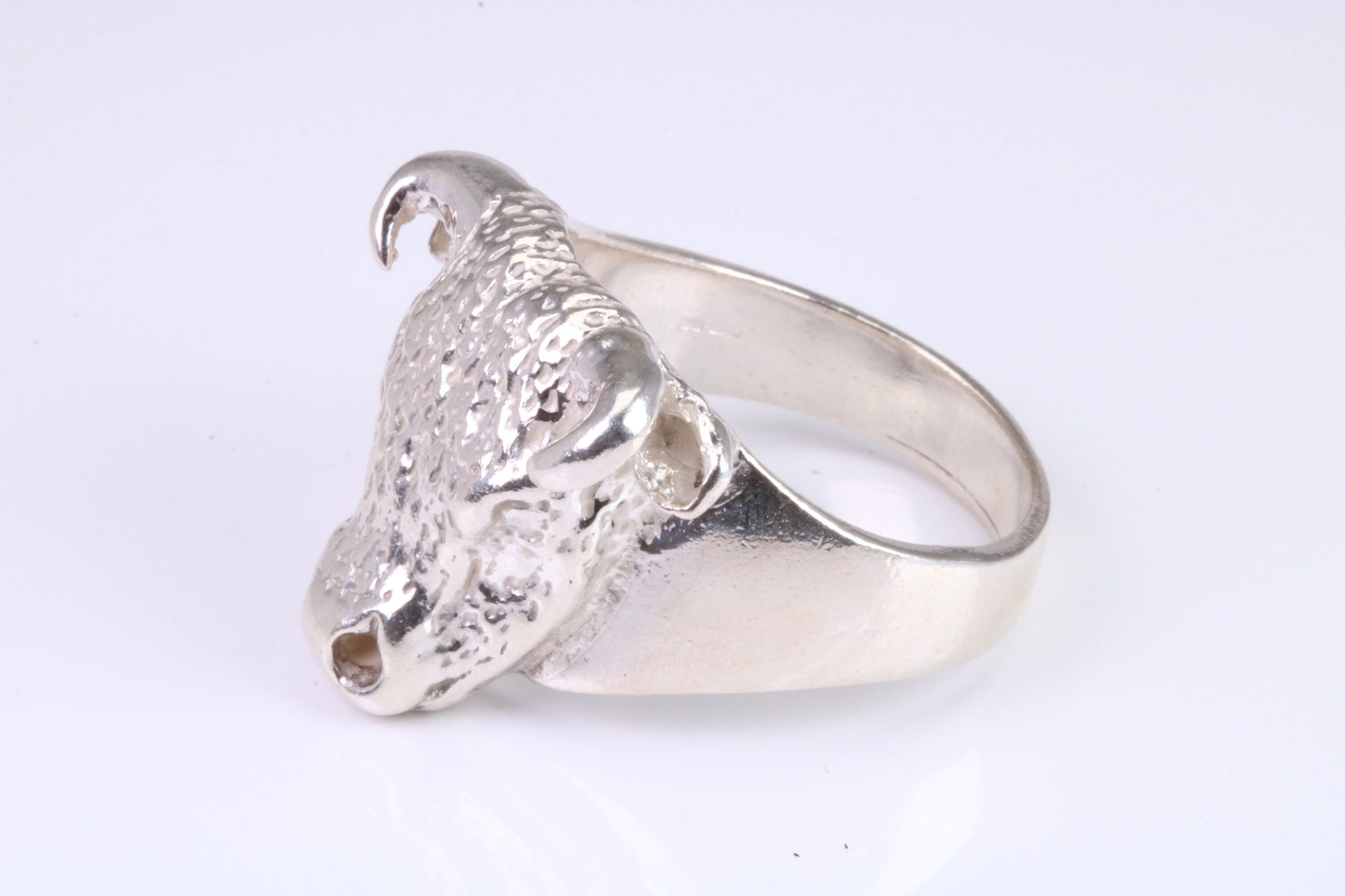 Very large and heavy Bulls head ring,solid silver, perfect for ladies and gents. Available in silver, yellow gold, white gold and platinum