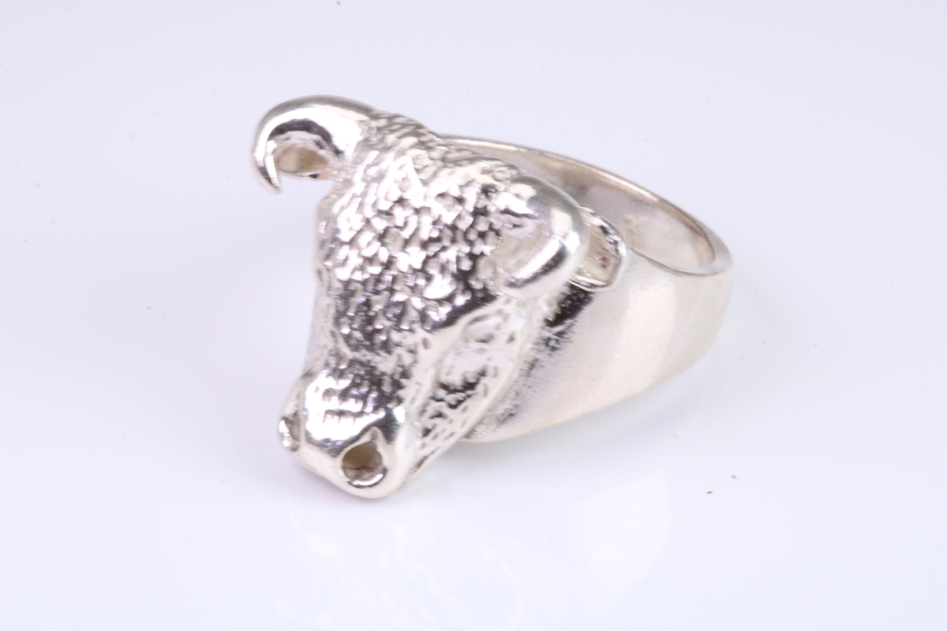 Very large and heavy Bulls head ring,solid silver, perfect for ladies and gents. Available in silver, yellow gold, white gold and platinum