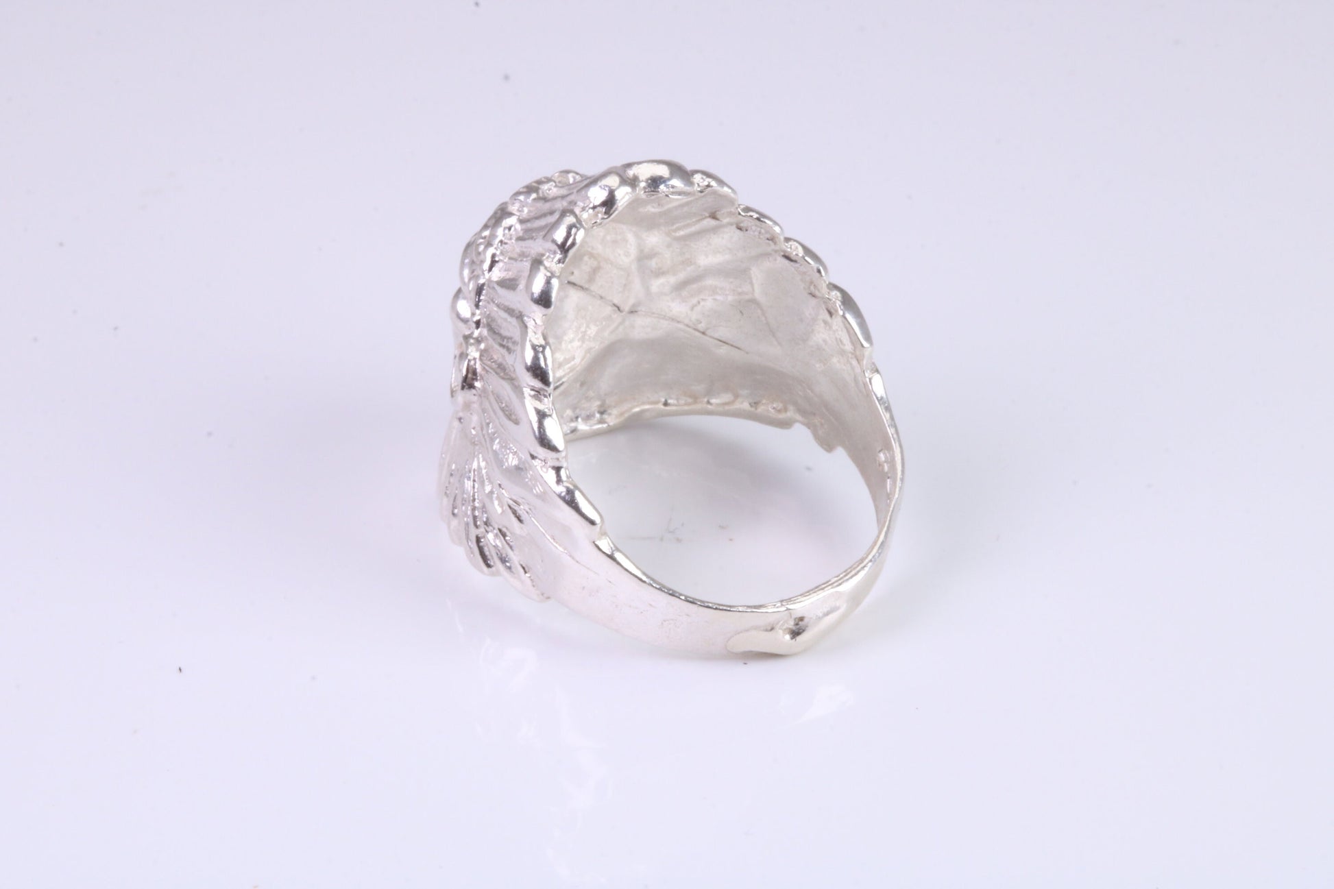 Large and heavy American Indian head ring, made from solid cast silver, British Hallmarked