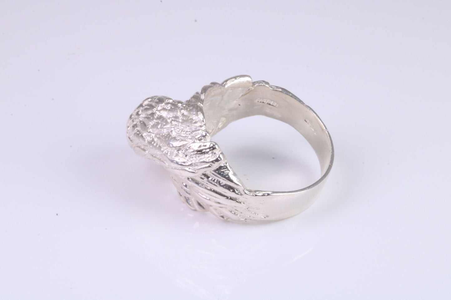 Large and heavy American Eagle Head ring, made from solid cast silver, British Hallmarked