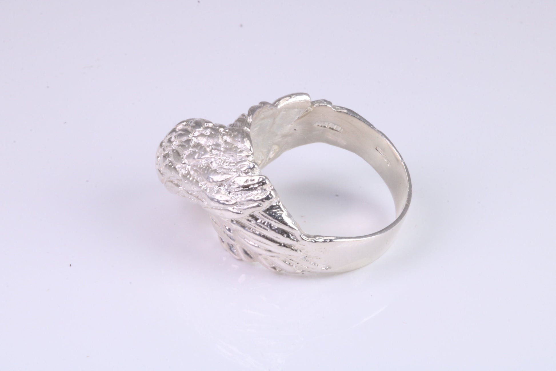 Large and heavy American Eagle Head ring, made from solid cast silver, British Hallmarked