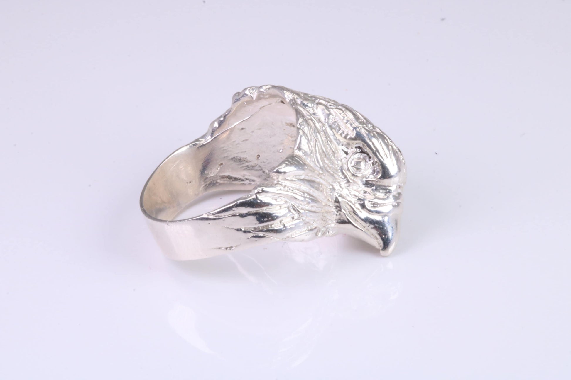 Large and heavy American Eagle Head ring, made from solid cast silver, British Hallmarked