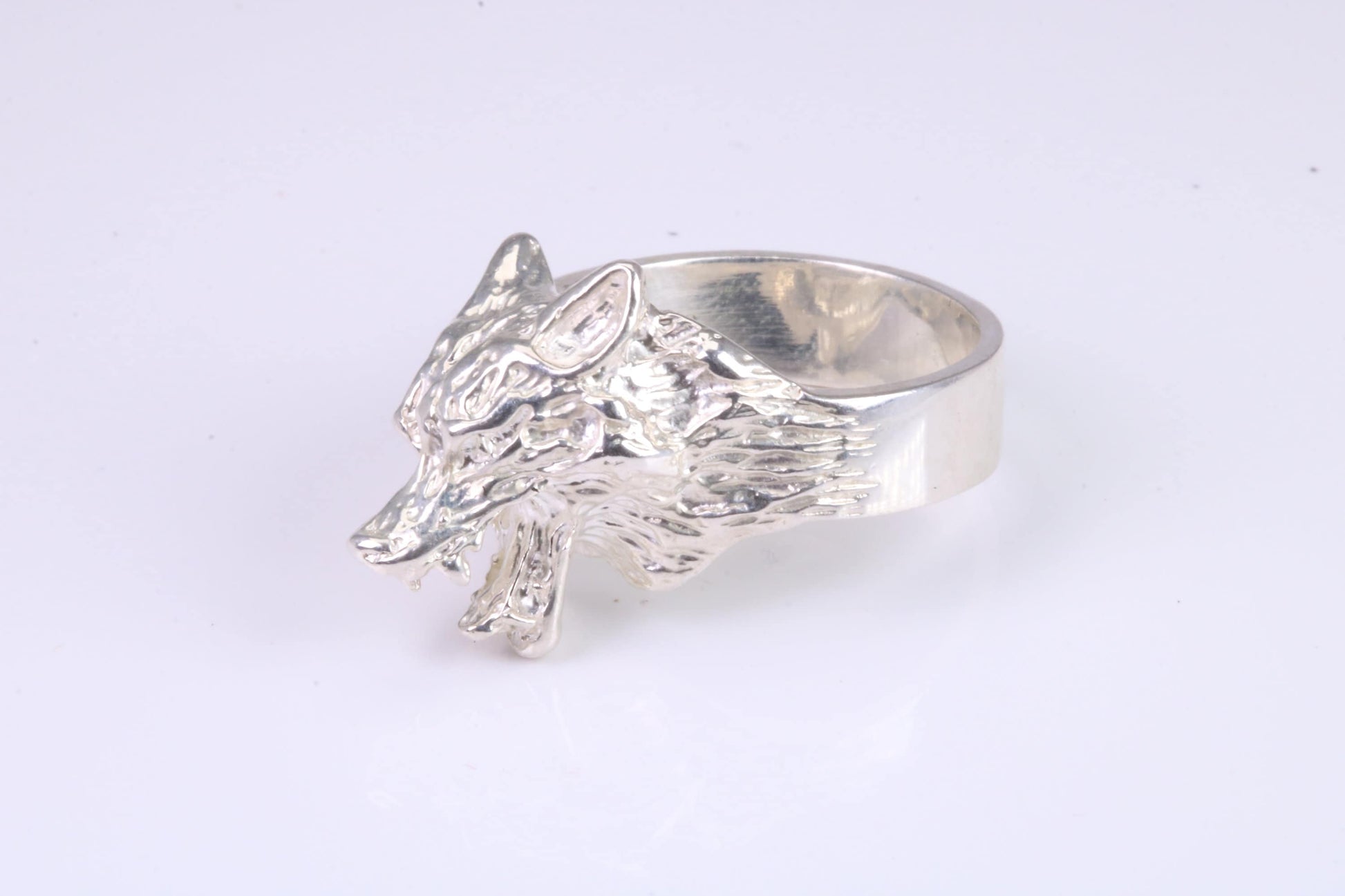 Large and heavy Wolf Head ring, made from solid cast silver, British Hallmarked