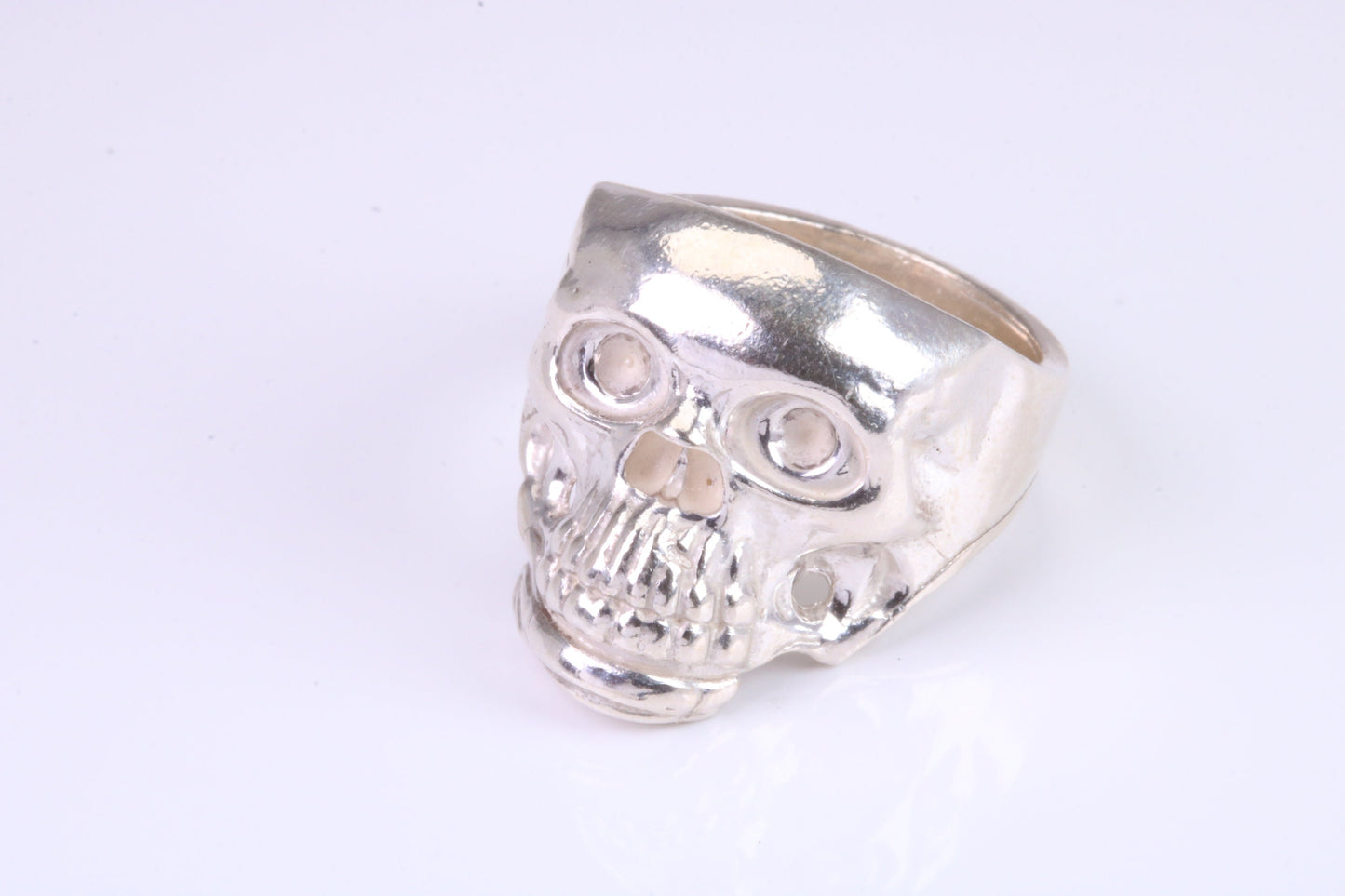 Large and heavy Skull ring,solid sterling silver, perfect for ladies and gents. Available in silver, yellow gold, white gold and platinum
