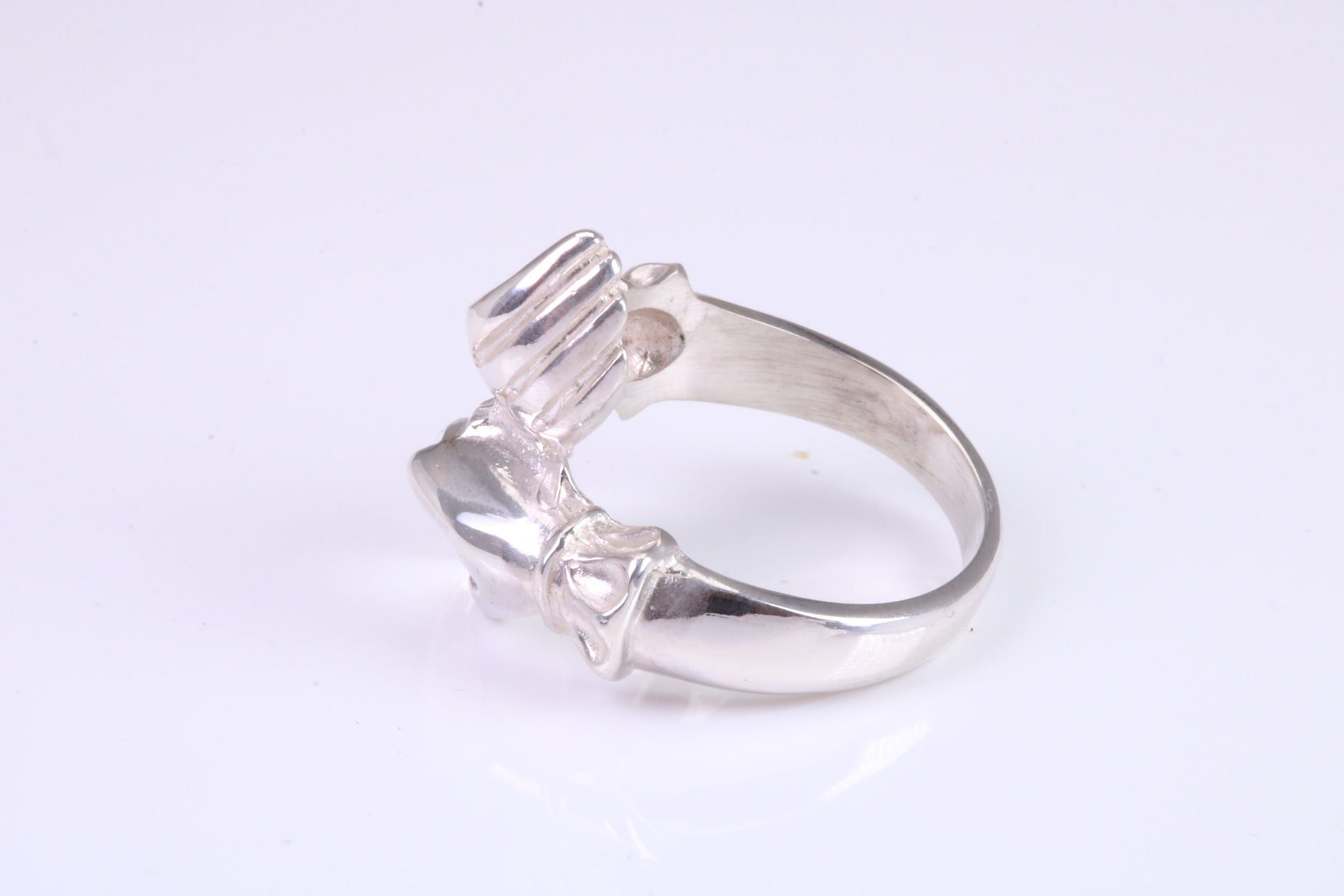 Two hands Ring, made from solid cast silver with high polished finish