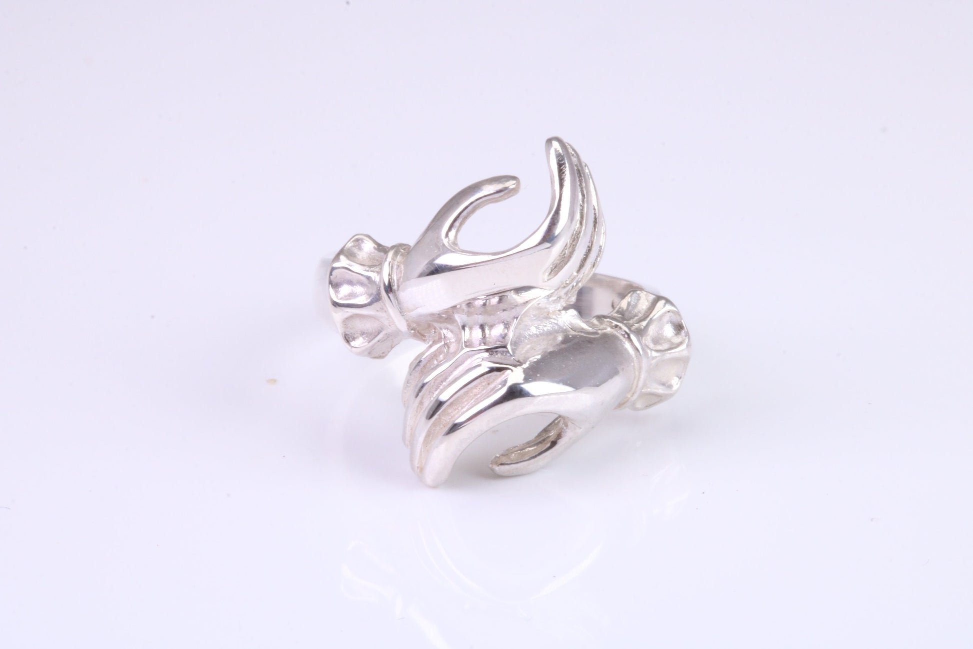 Two hands Ring, made from solid cast silver with high polished finish