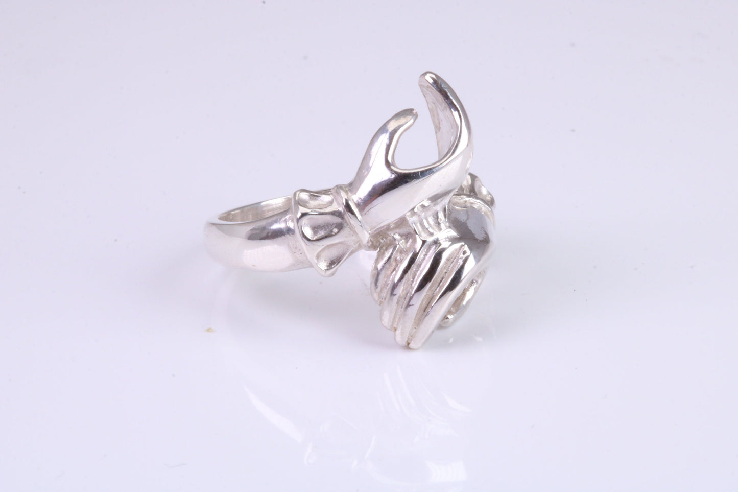 Two hands Ring, made from solid cast silver with high polished finish