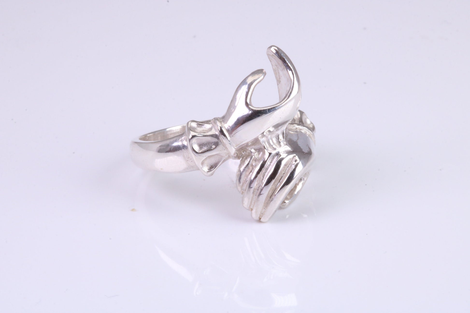 Two hands Ring, made from solid cast silver with high polished finish