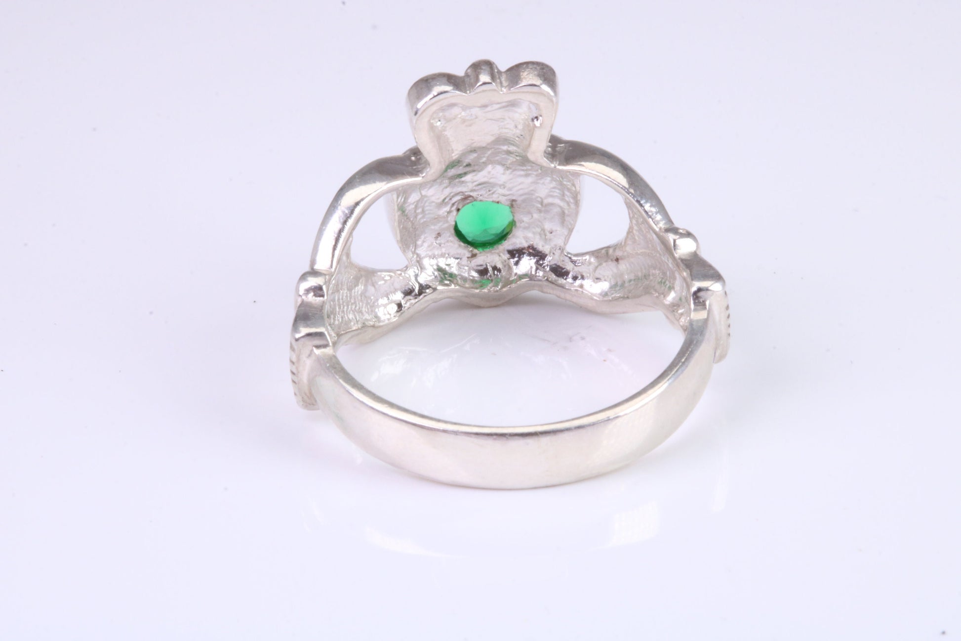 Large and heavy stone set Claddagh ring, set with Emerald Green C Z, solid cast silver