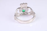 Large and heavy stone set Claddagh ring, set with Emerald Green C Z, solid cast silver