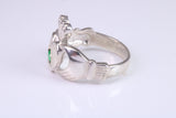 Large and heavy stone set Claddagh ring, set with Emerald Green C Z, solid cast silver
