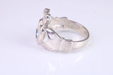 Large and heavy stone set Claddagh ring, set with Sapphire Blue C Z, solid cast silver