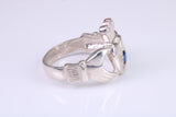 Large and heavy stone set Claddagh ring, set with Sapphire Blue C Z, solid cast silver