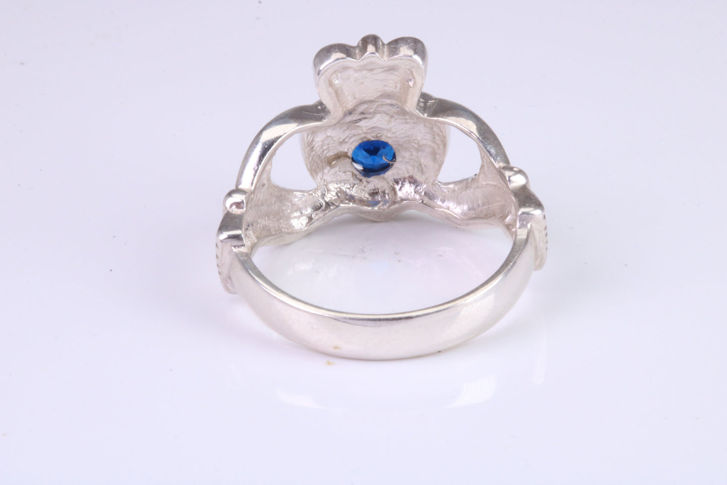 Large and heavy stone set Claddagh ring, set with Sapphire Blue C Z, solid cast silver