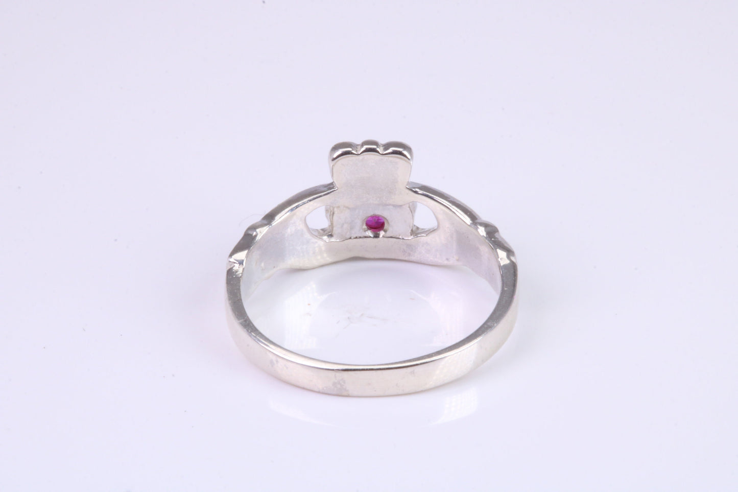 Dainty Ruby Red C Z set Claddagh ring, set with Ruby Red C Z, solid cast silver