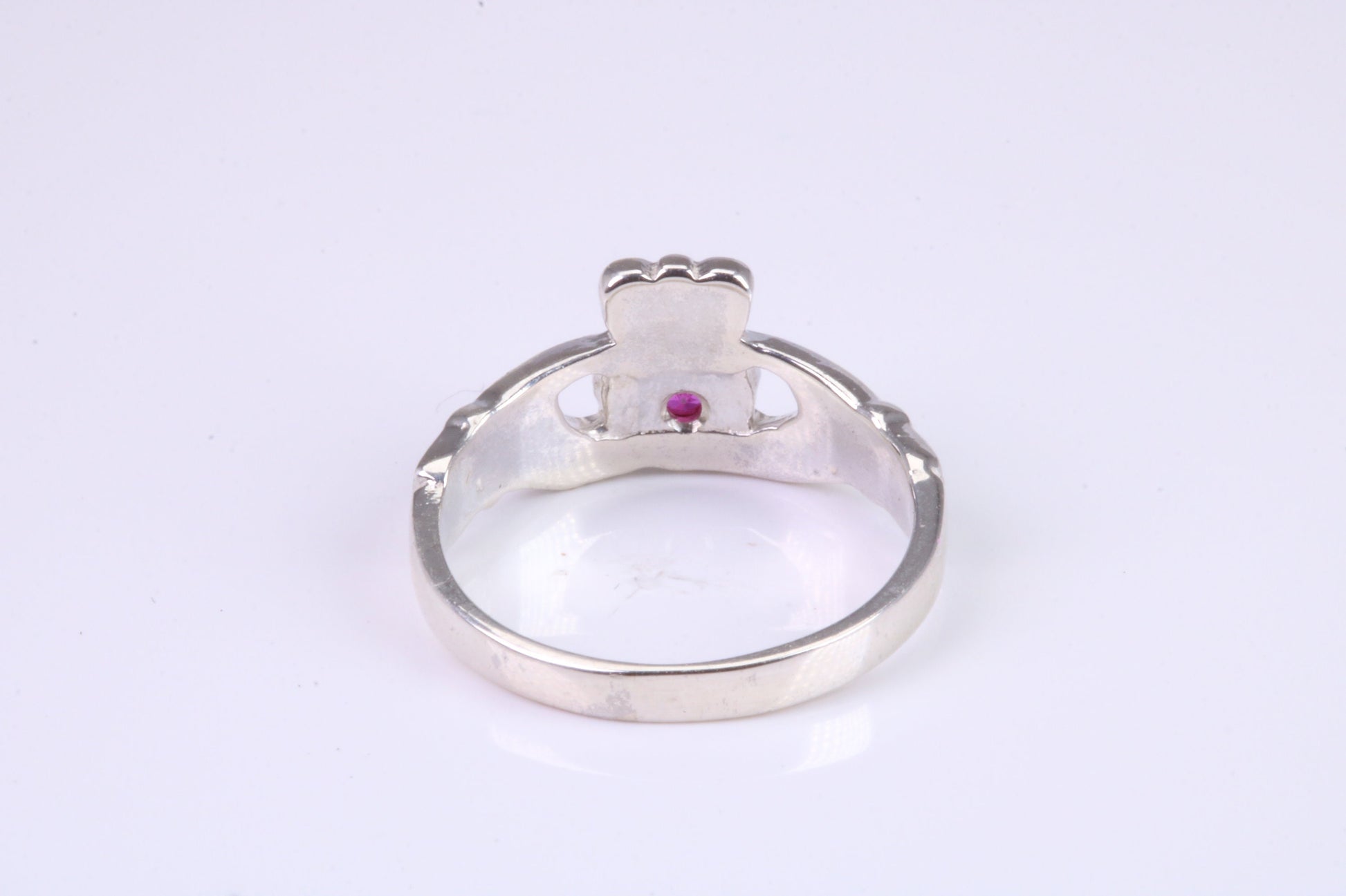 Dainty Ruby Red C Z set Claddagh ring, set with Ruby Red C Z, solid cast silver