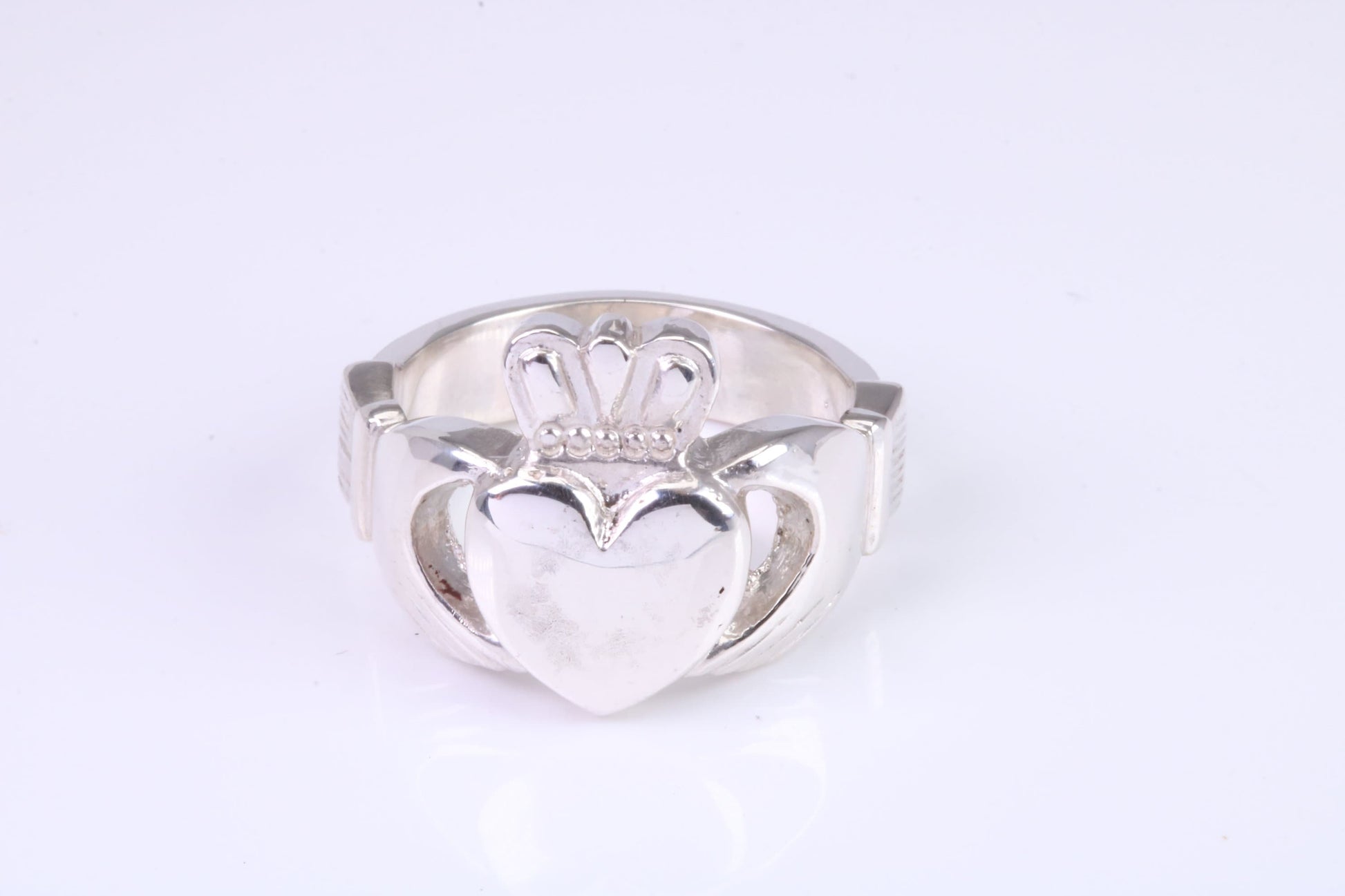 Large and heavy Claddagh ring, made from solid cast silver, British hallmarked