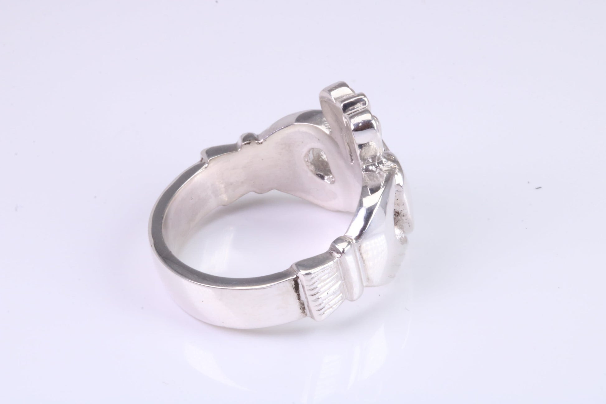 Large and heavy Claddagh ring, made from solid cast silver, British hallmarked