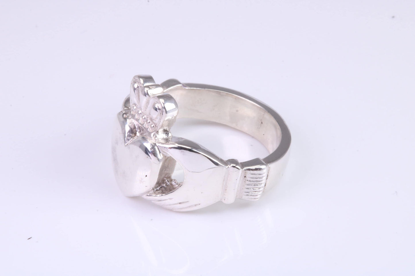 Large and heavy Claddagh ring, made from solid cast silver, British hallmarked