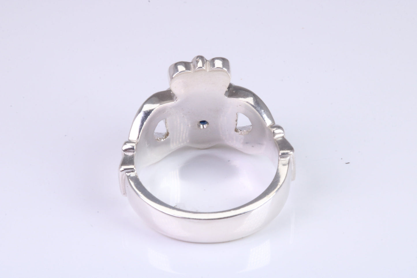 Large and heavy Sapphire Blue C Z set Claddagh ring, made from solid cast silver, British hallmarked