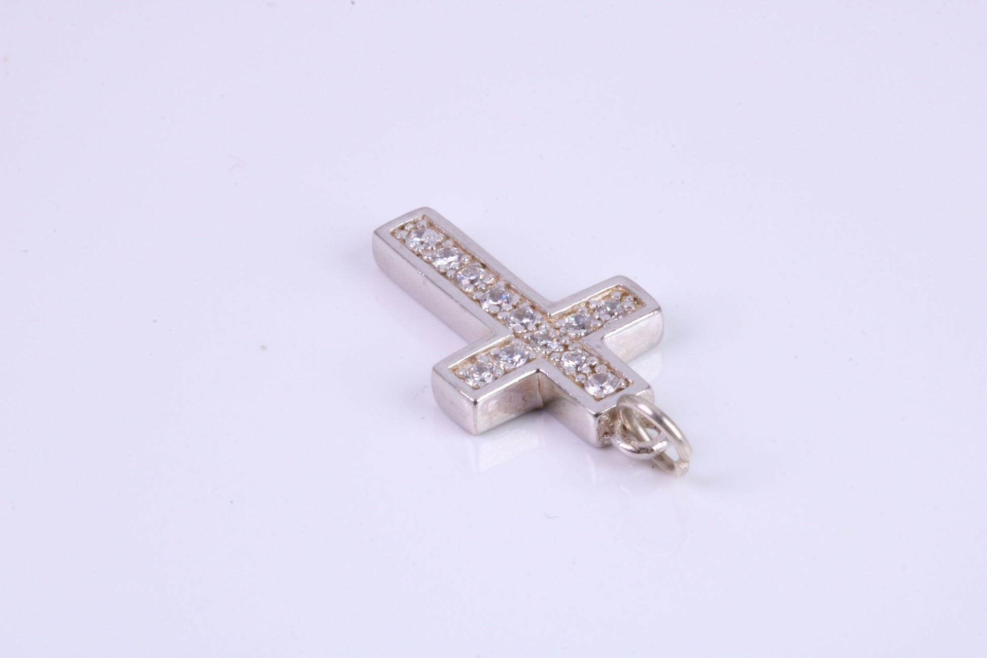 Small 23 mm Long Diamond White C Z set Silver Cross, Made From Solid Cast Silver