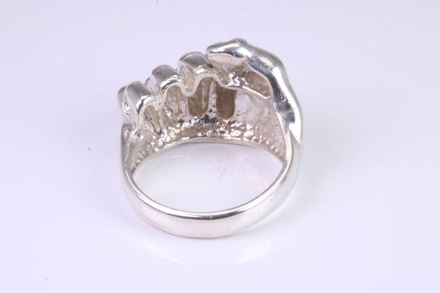 Very large and very heavy fist ring set with diamond white top grade cubic zirconia's, made from solid cast Silver , British Hallmarked